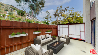 a outdoor living space with patio furniture