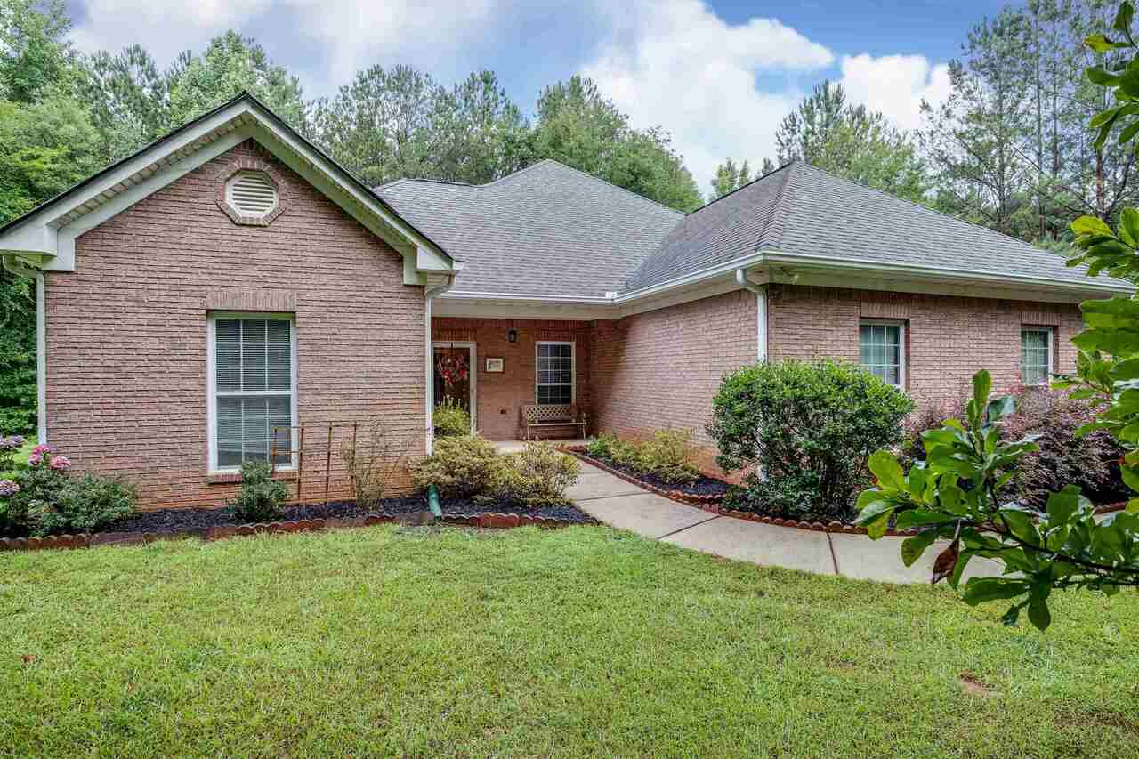 787 Jackson Lake Road Jackson, GA 30233 - Photo 1 of 1 a front view of a house with a yard