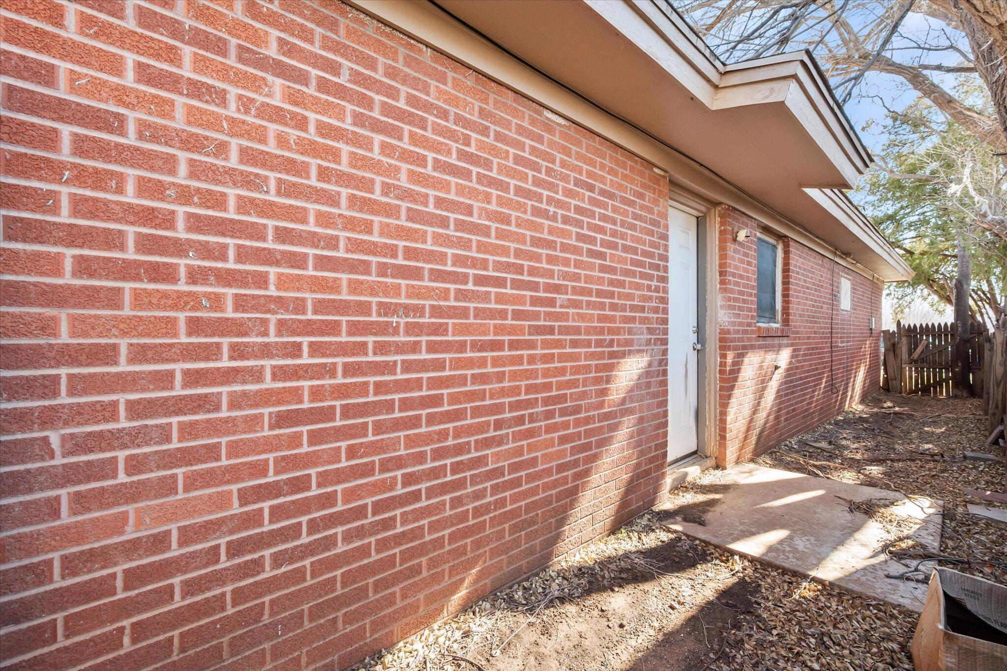 2302 62nd Street Lubbock, TX 79412 - Photo 26 of 38 a view of a brick wall
