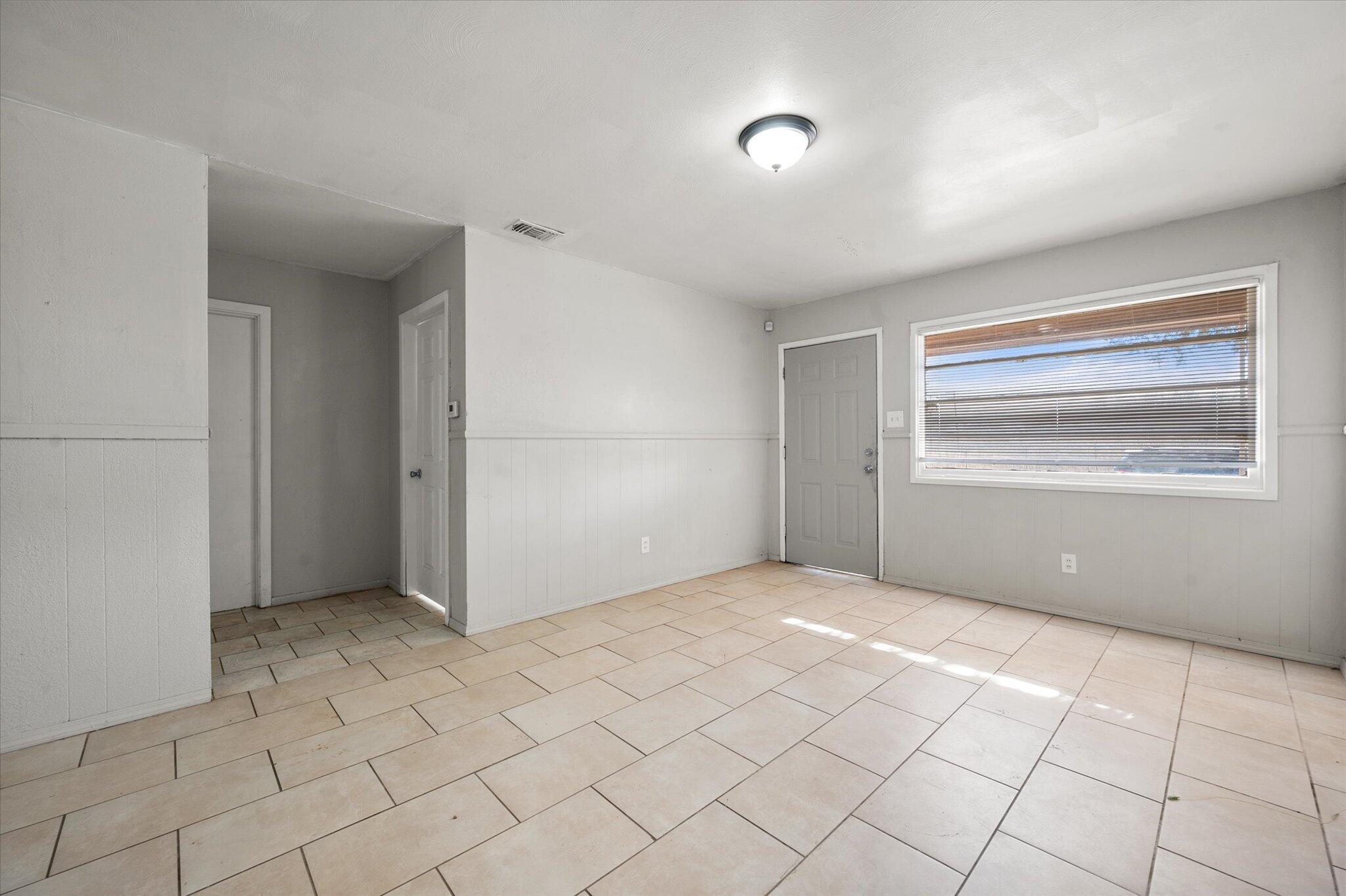 2302 62nd Street Lubbock, TX 79412 - Photo 31 of 38 a view of an empty room and window