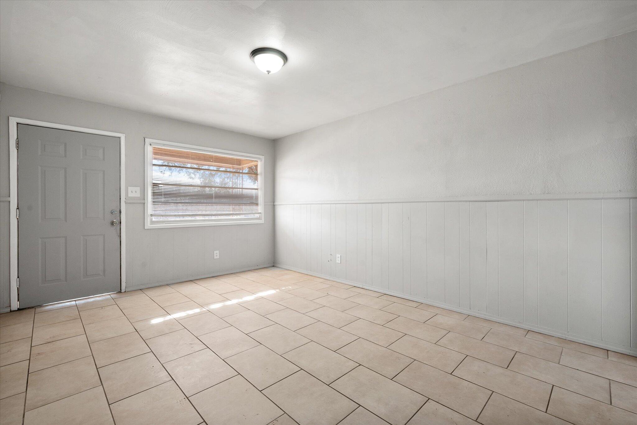 2302 62nd Street Lubbock, TX 79412 - Photo 32 of 38 a view of an empty room and window