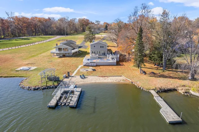 a swimming pool view with a garden space