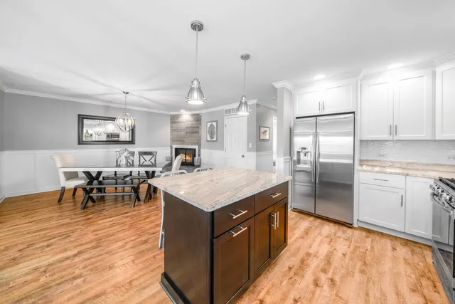 a view of a terrace with wooden floor and city view