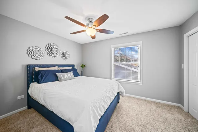 a view of a backyard with sitting area