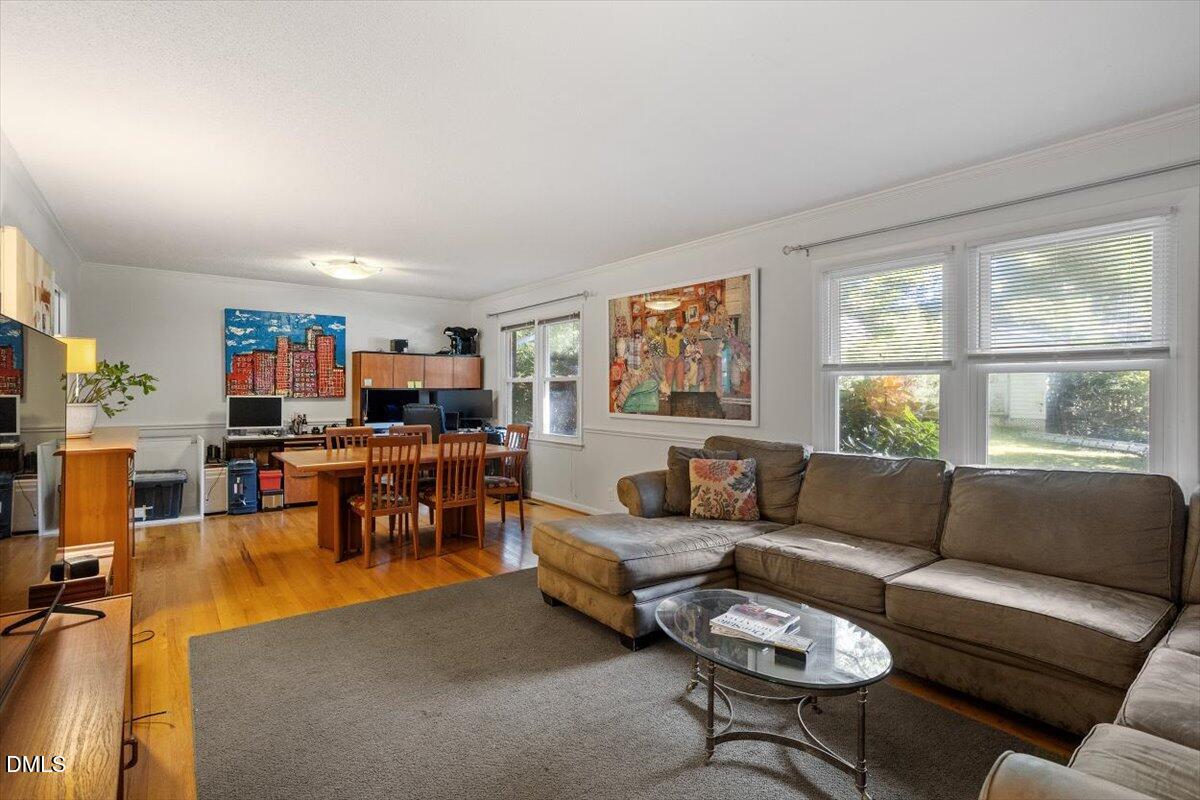 2100 Nancy Ann Drive Raleigh, NC 27607 - Photo 18 of 33 a living room with furniture and a window