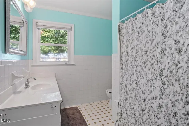 a bathroom with a sink and a shower