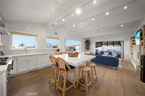 a bedroom with bed and a potted plant