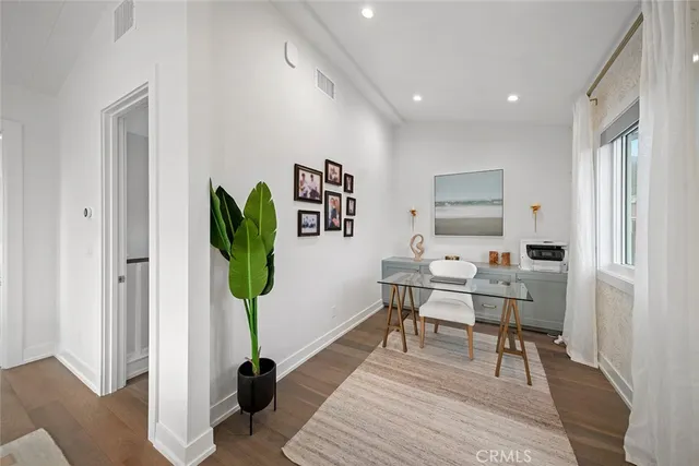a spacious bathroom with a tub and shower
