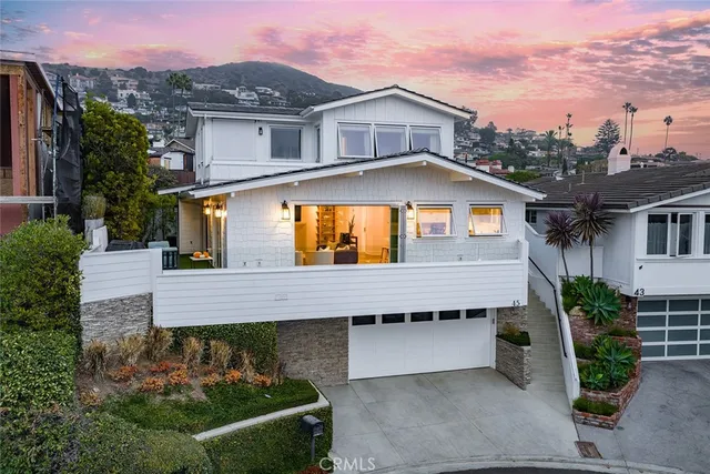 an aerial view of a city with lots of residential buildings