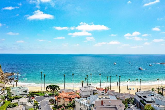 a front view of a house with garage