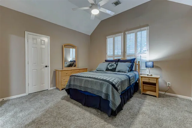 a bathroom with a sink a vanity and a large mirror