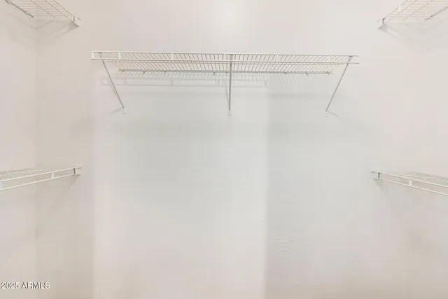 a view of a room with an empty space