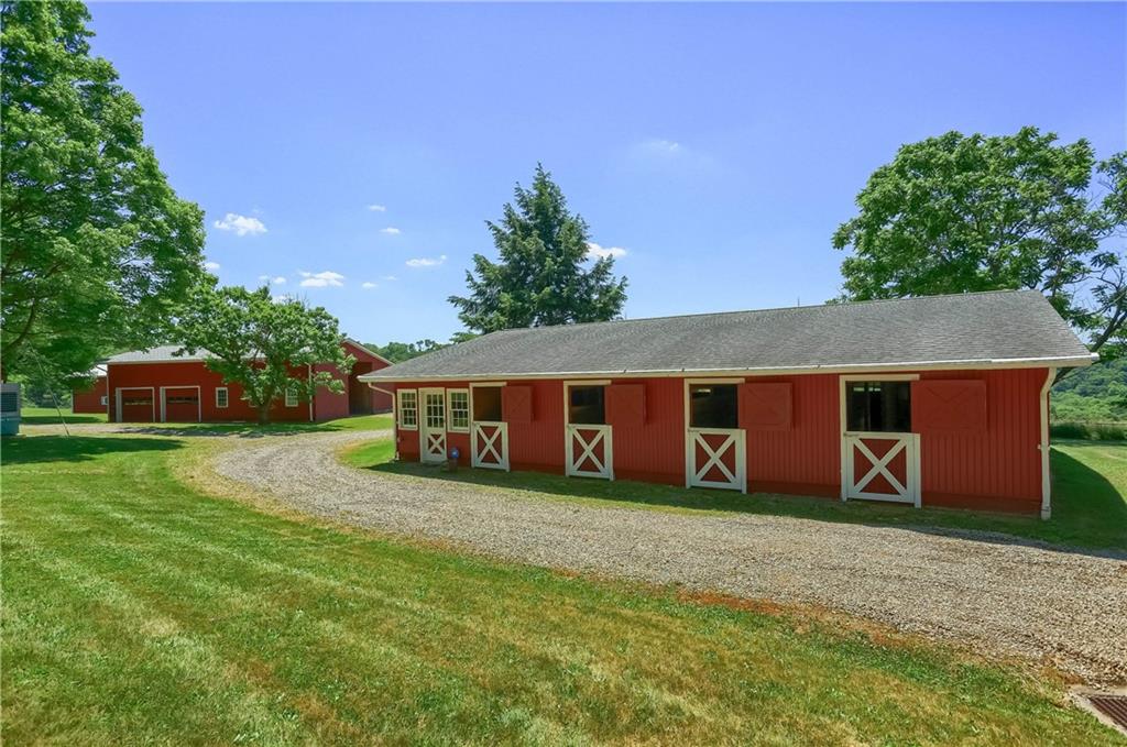 610 Dick Road Renfrew, PA 16001 - Photo 17 of 25 a view of a house with a yard