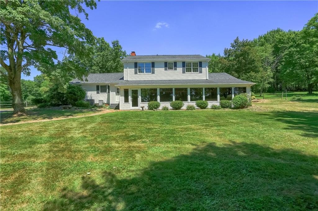 610 Dick Road Renfrew, PA 16001 - Photo 21 of 25 a view of a house with a backyard