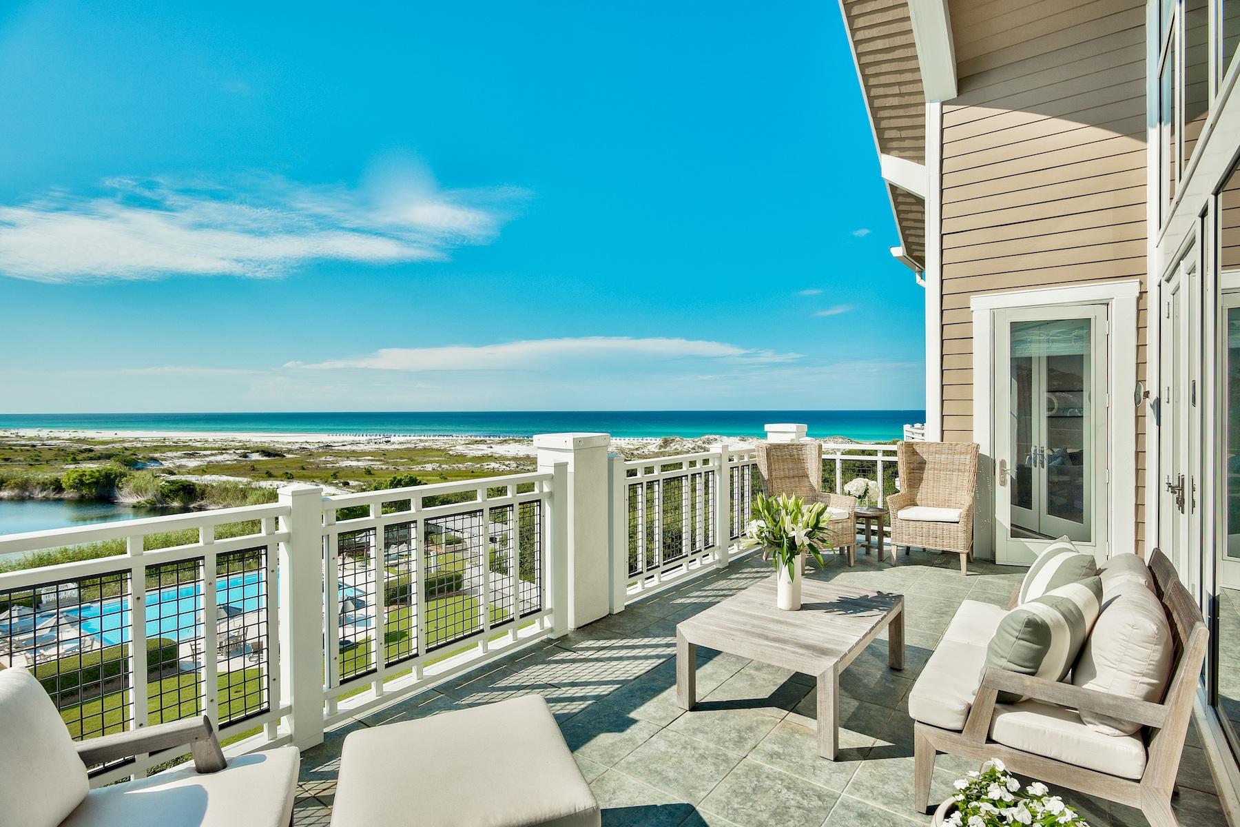 37 Compass Point Way South, Unit 420 Watersound, FL 32461 - Photo 1 of 24 a balcony with furniture and outdoor view
