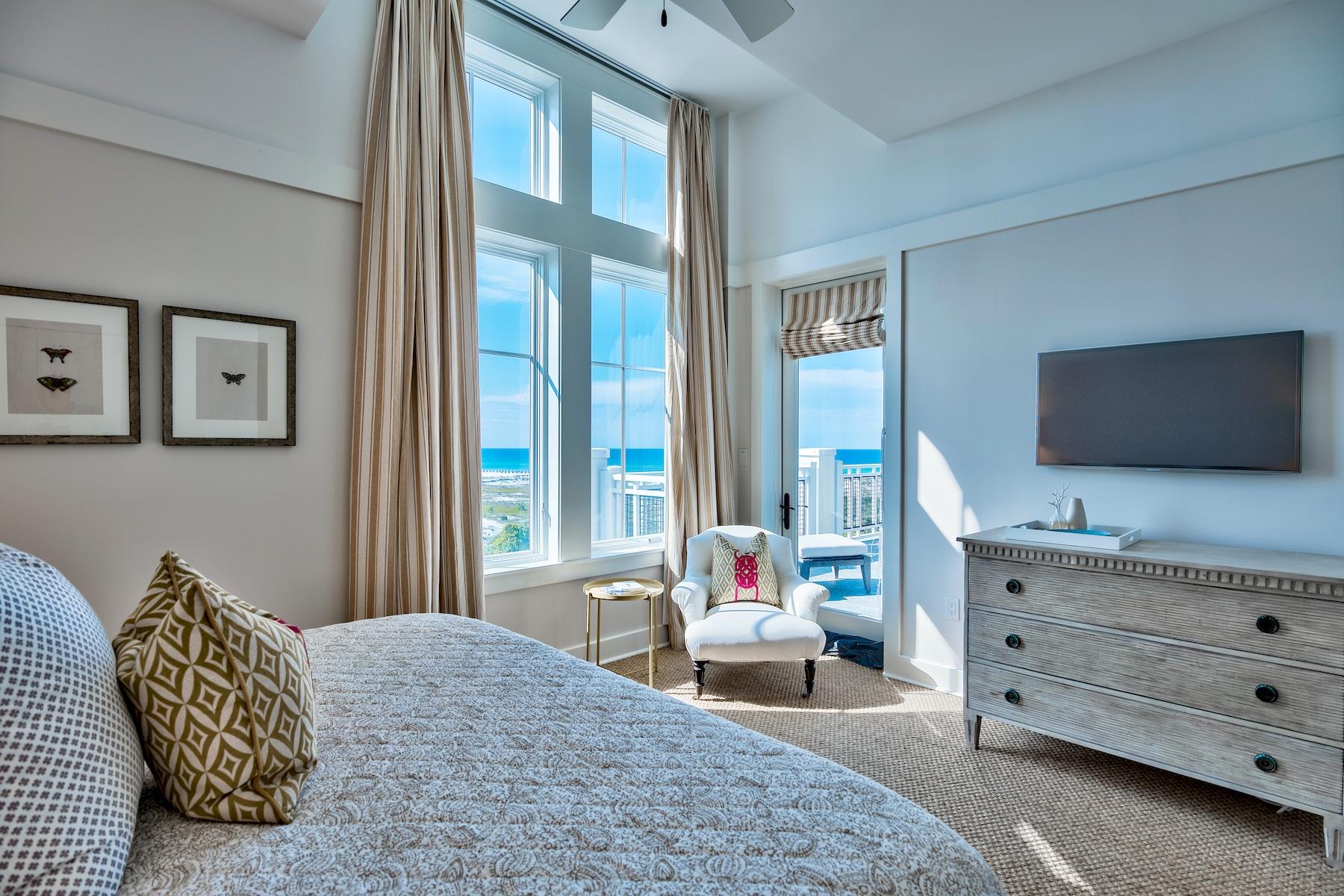 37 Compass Point Way South, Unit 420 Watersound, FL 32461 - Photo 17 of 24 a bedroom with a bed and a flat screen tv