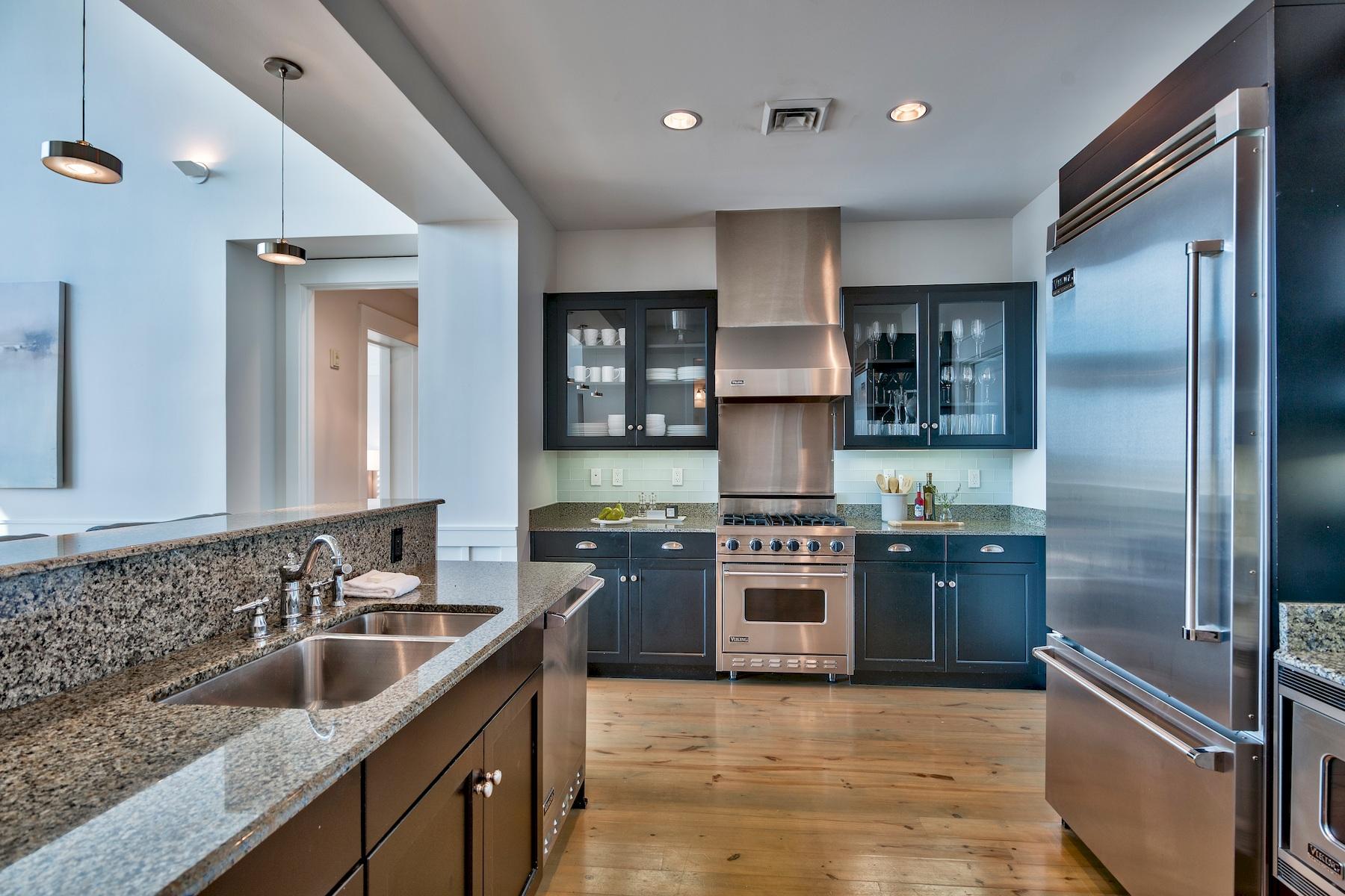 37 Compass Point Way South, Unit 420 Watersound, FL 32461 - Photo 4 of 24 a kitchen with stainless steel appliances granite countertop a sink stove and refrigerator