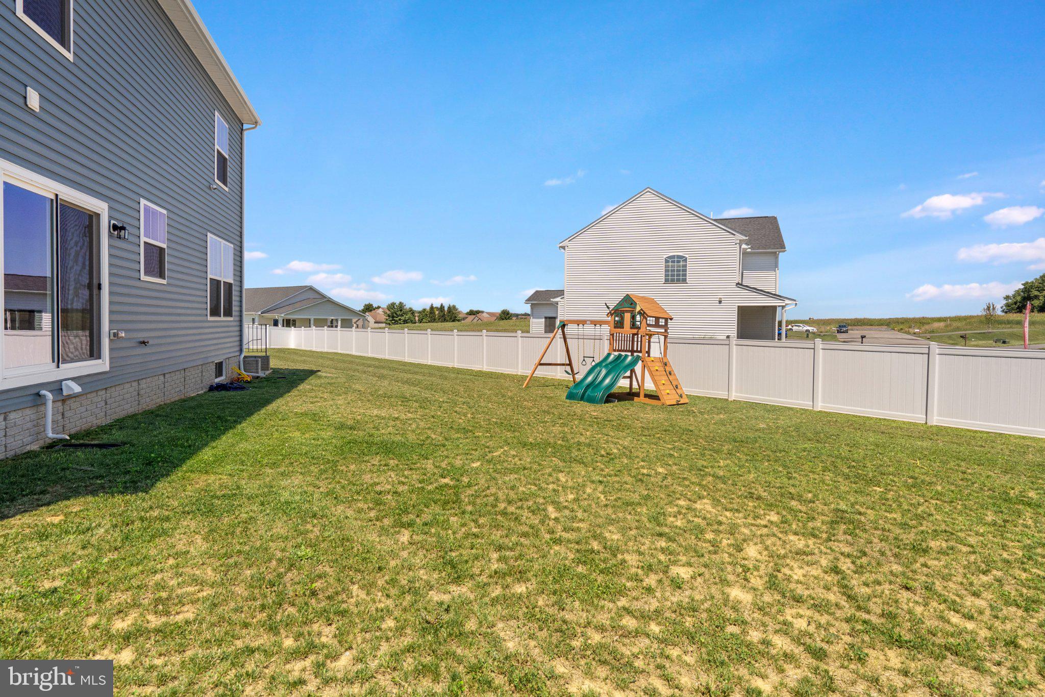 18950 Amesbury Road Hagerstown, MD 21742 - Photo 33 of 35 Spacious yard with playset and fence.