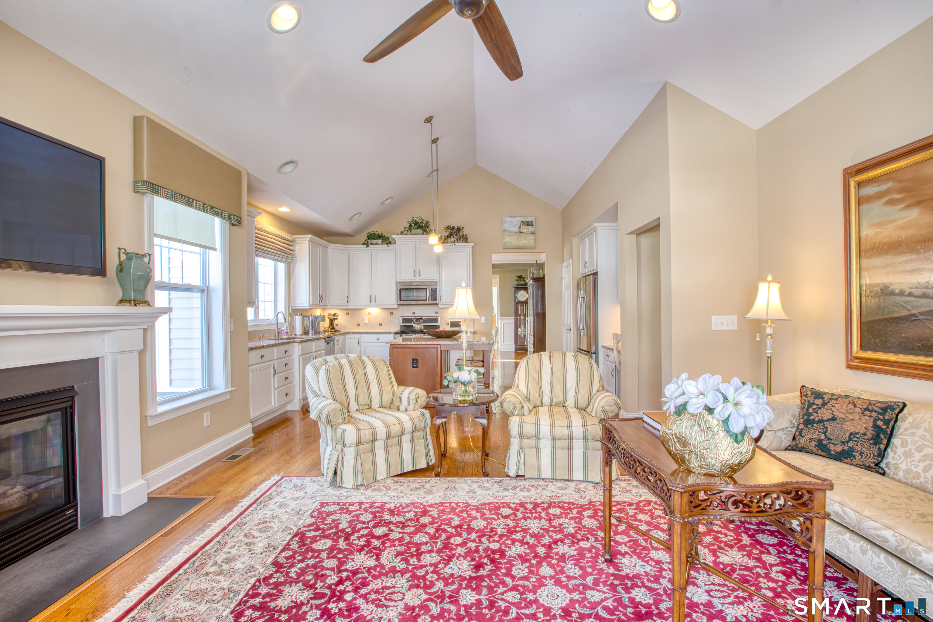 12 Briar Ridge Drive, Unit 12 Bethel, CT 06801 - Photo 13 of 34 a living room with furniture and a fireplace
