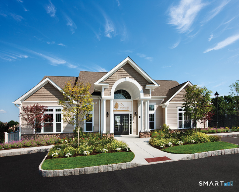 12 Briar Ridge Drive, Unit 12 Bethel, CT 06801 - Photo 30 of 34 front view of a house with a yard