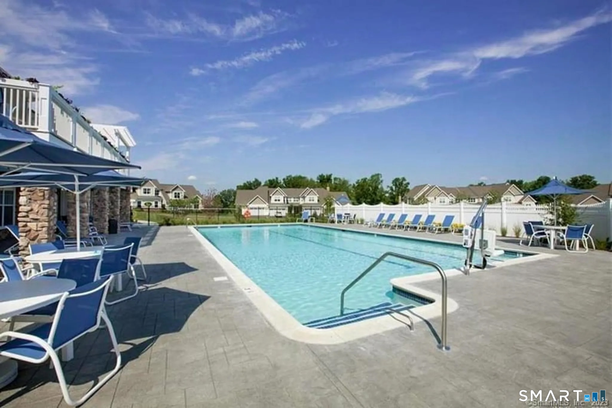 12 Briar Ridge Drive, Unit 12 Bethel, CT 06801 - Photo 31 of 34 a view of a chairs and table in patio