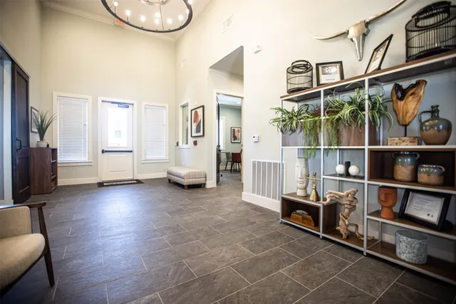 a view of livingroom with furniture and a flat screen tv