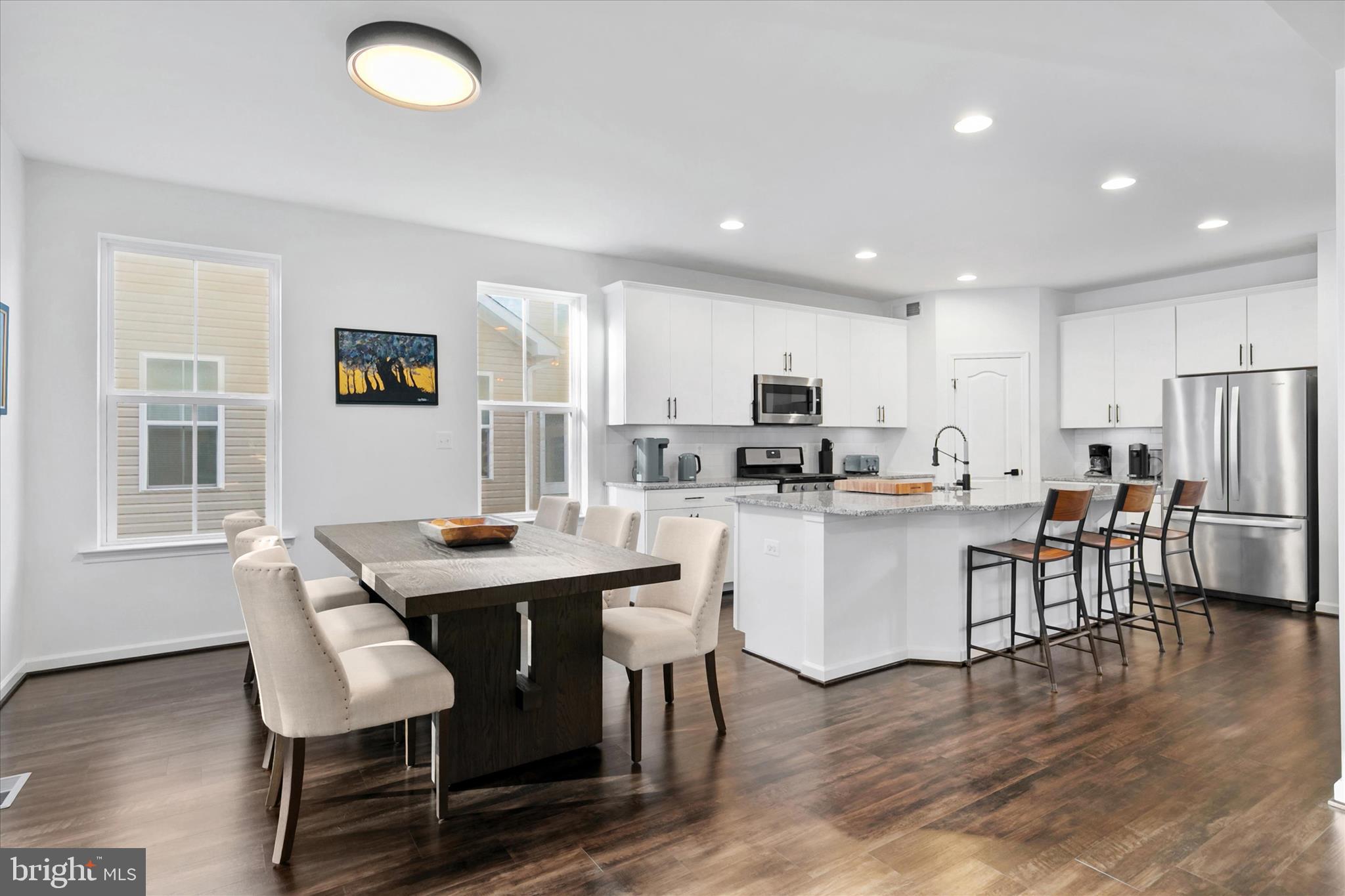 36114 Watch Hill Road Frankford, DE 19945 - Photo 14 of 80 a living room with stainless steel appliances kitchen island granite countertop furniture wooden floor and a kitchen view