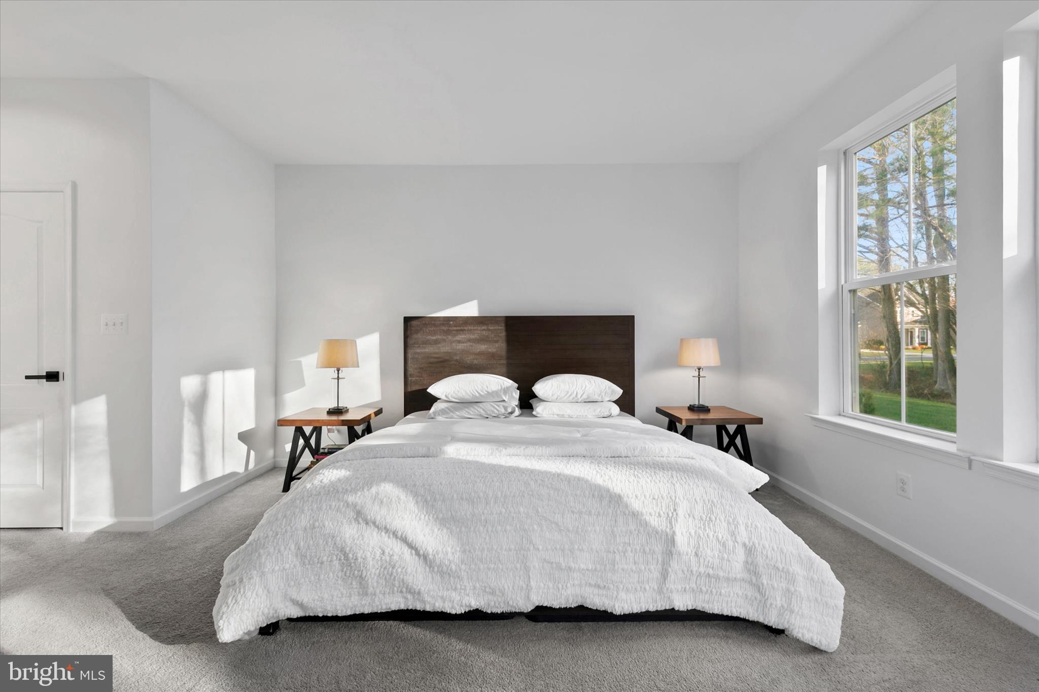 36114 Watch Hill Road Frankford, DE 19945 - Photo 18 of 80 a bedroom with a bed and a window