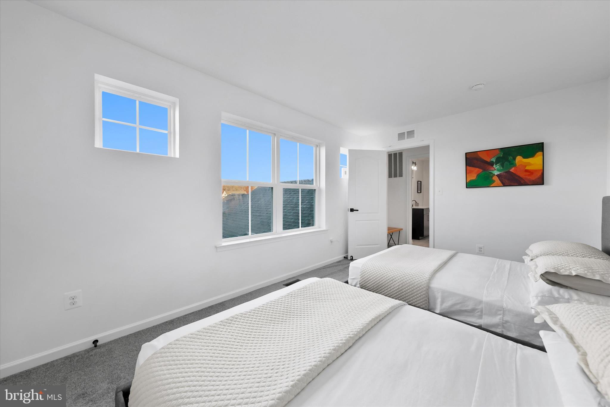 36114 Watch Hill Road Frankford, DE 19945 - Photo 34 of 80 a bedroom with a bed and a window