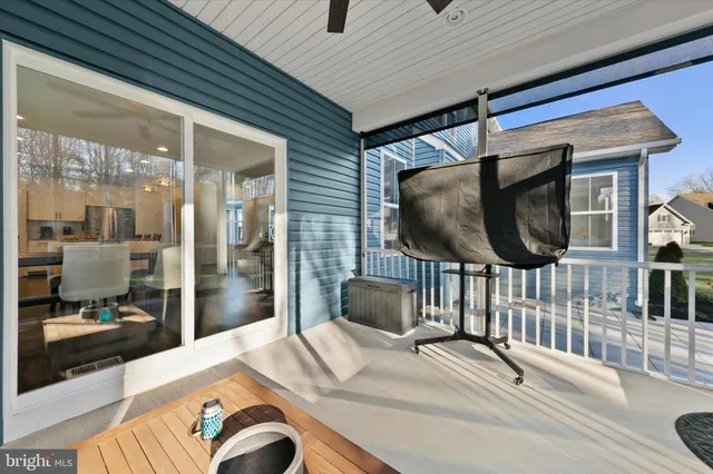 a view of a swimming pool and a yard