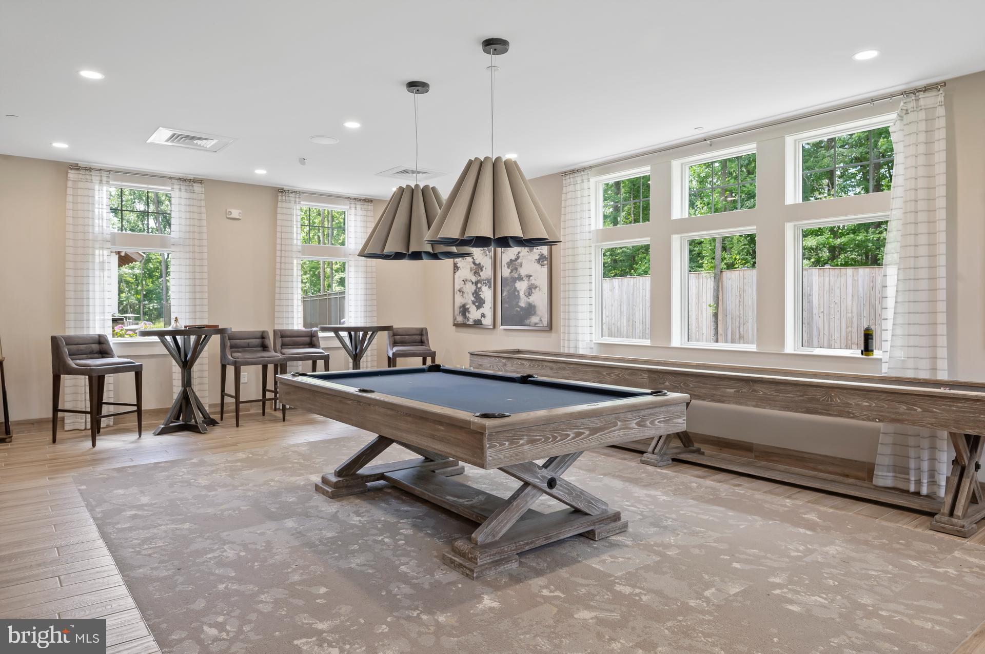 36114 Watch Hill Road Frankford, DE 19945 - Photo 53 of 80 a living room with furniture a window and a table