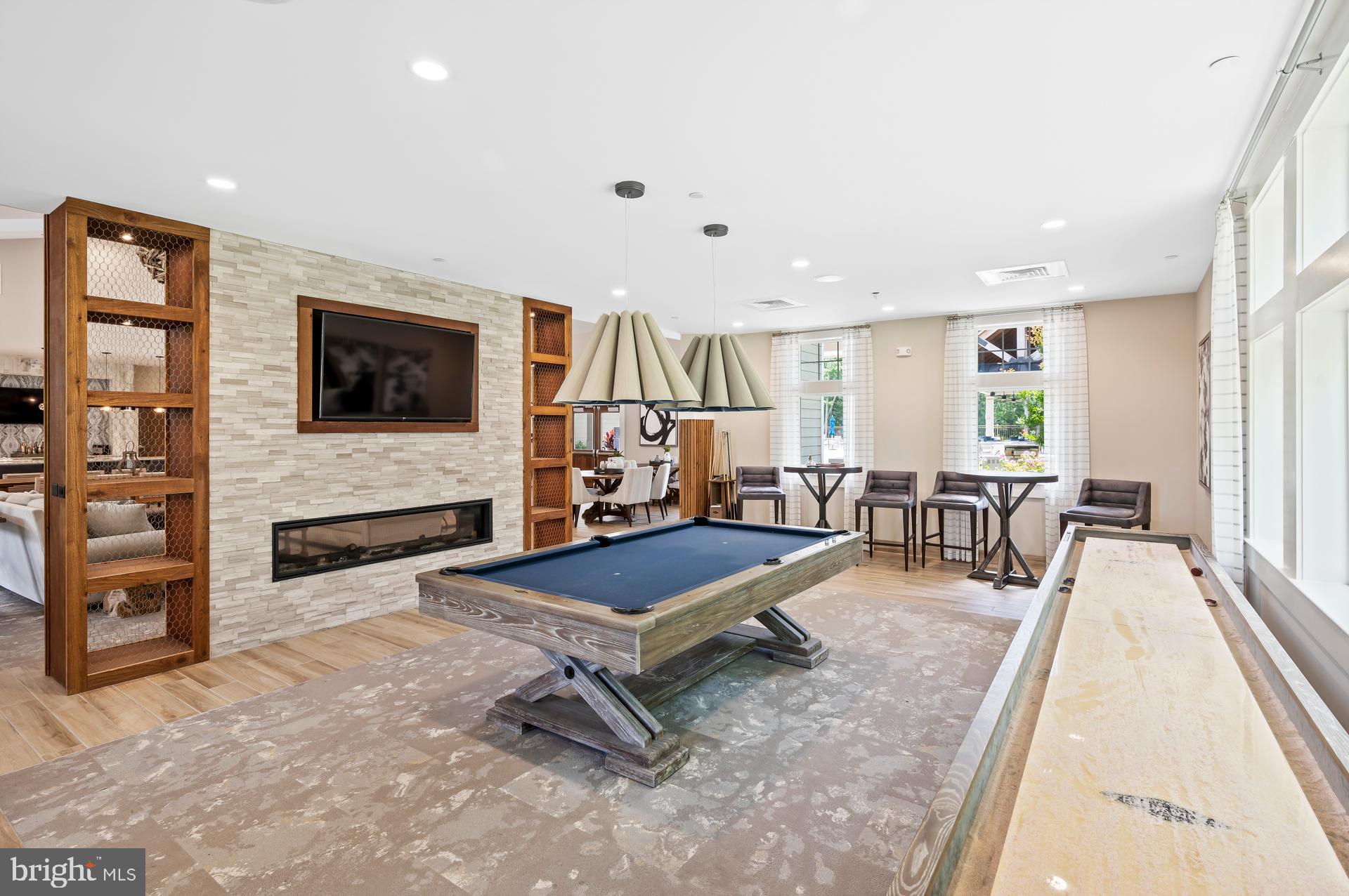 36114 Watch Hill Road Frankford, DE 19945 - Photo 55 of 80 a living room with furniture and a flat screen tv