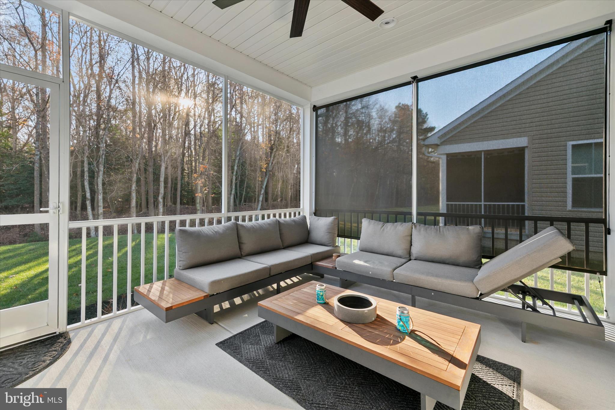 36114 Watch Hill Road Frankford, DE 19945 - Photo 6 of 80 a living room with furniture and a floor to ceiling window