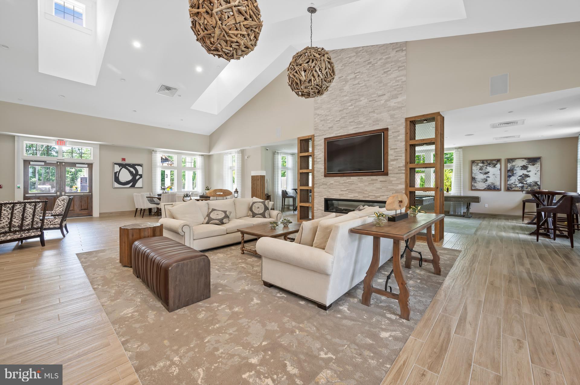 36114 Watch Hill Road Frankford, DE 19945 - Photo 76 of 80 a living room with fireplace furniture and a flat screen tv