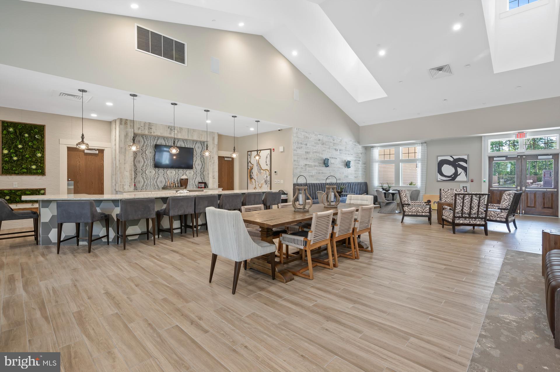 36114 Watch Hill Road Frankford, DE 19945 - Photo 77 of 80 a view of a dining room with furniture and wooden floor