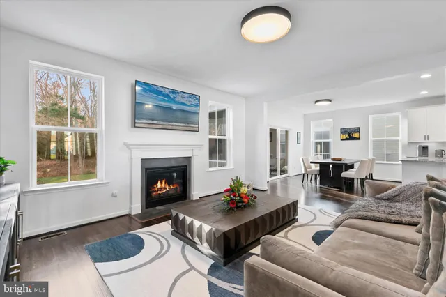 a kitchen with counter space appliances and furniture