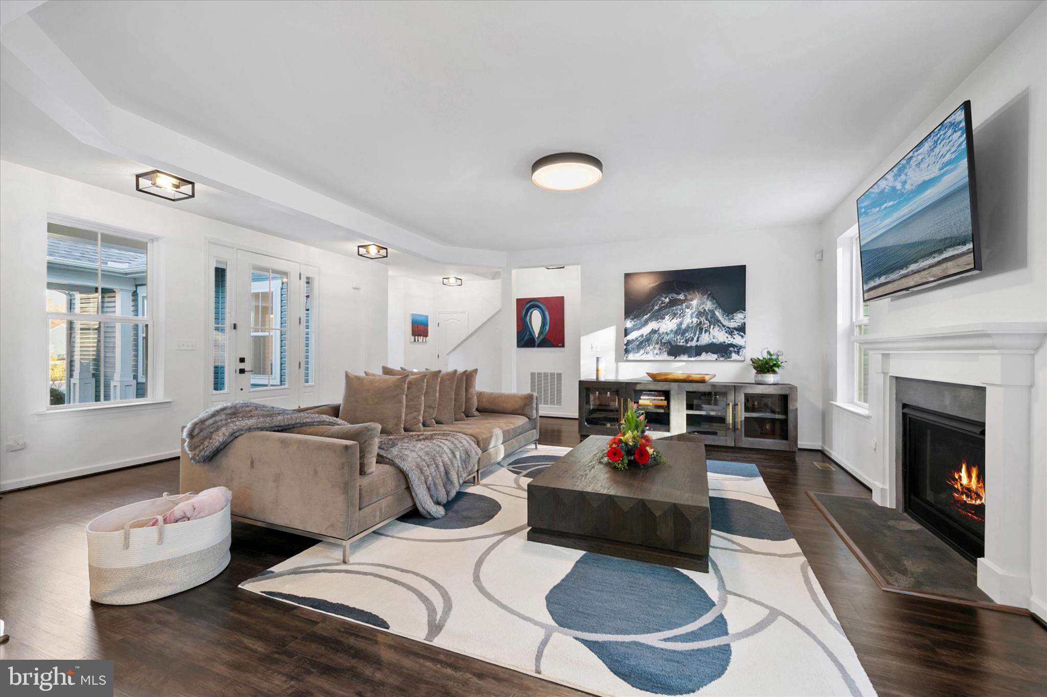 36114 Watch Hill Road Frankford, DE 19945 - Photo 9 of 80 a living room with furniture fireplace and flat screen tv