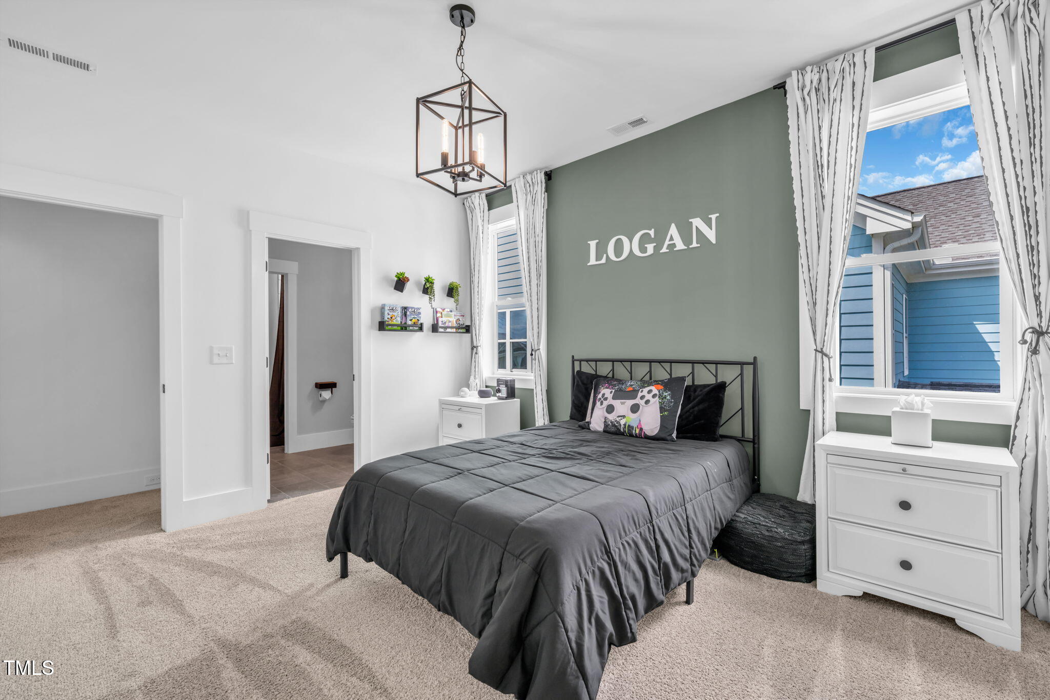 325 Liberty Star Road Wendell, NC 27591 - Photo 46 of 83 a bedroom with a bed and a dresser