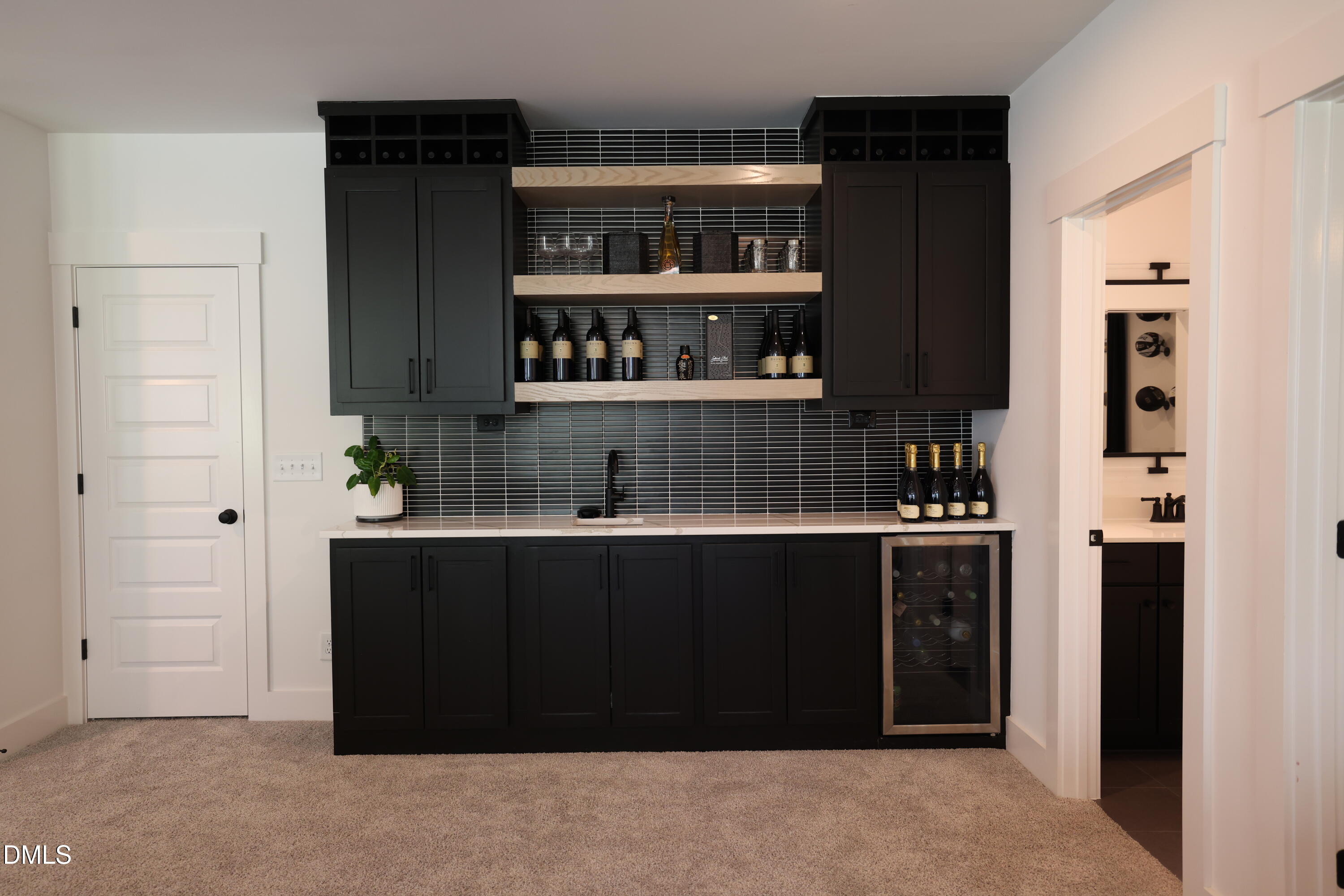 325 Liberty Star Road Wendell, NC 27591 - Photo 69 of 83 a kitchen with stainless steel appliances a refrigerator and cabinets