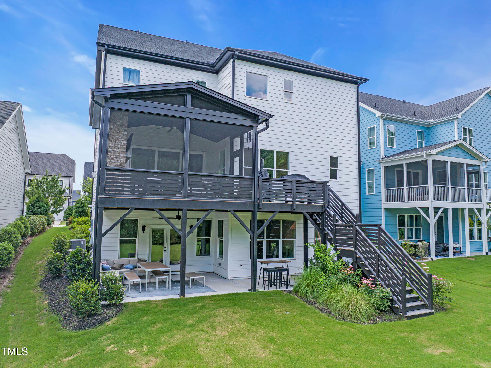325 Liberty Star Road Wendell, NC 27591 - Photo 73 of 83 a front view of a house with a yard table and chairs
