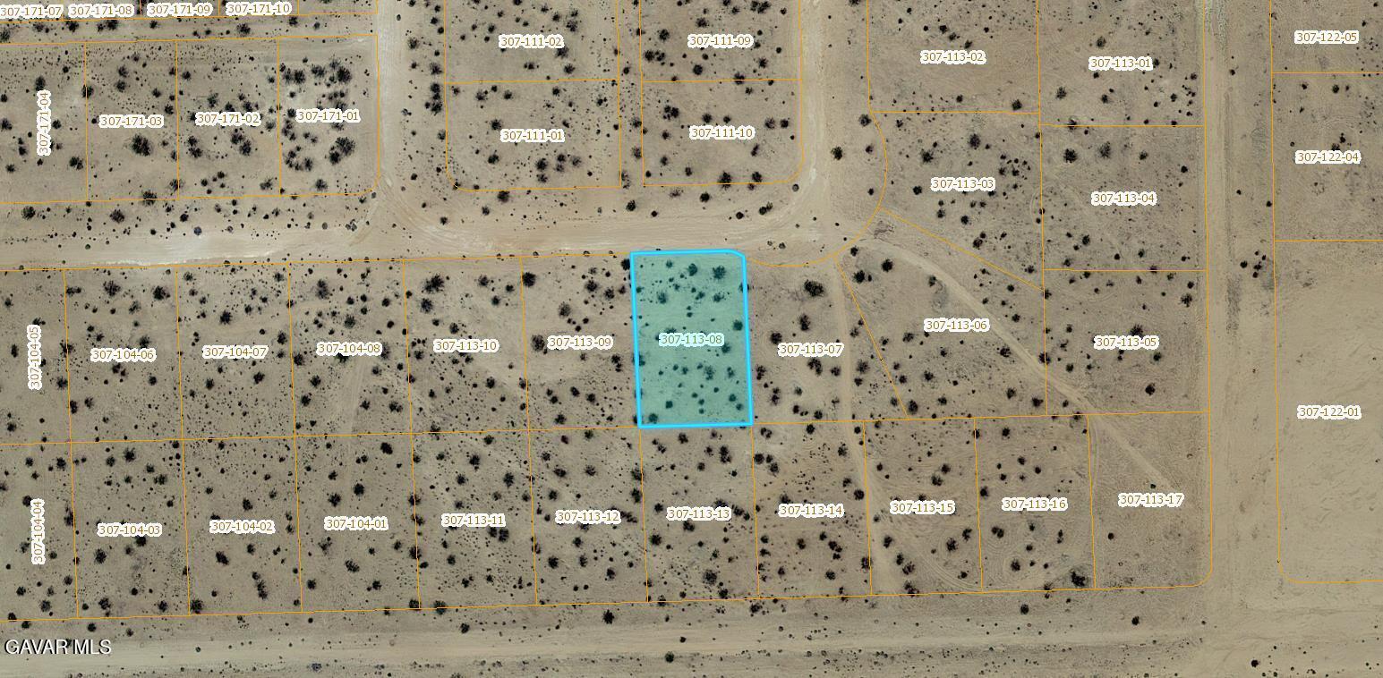 Bucknell Road California City, CA 93505 - Photo 3 of 16 a bathroom with a shower curtain and a sink