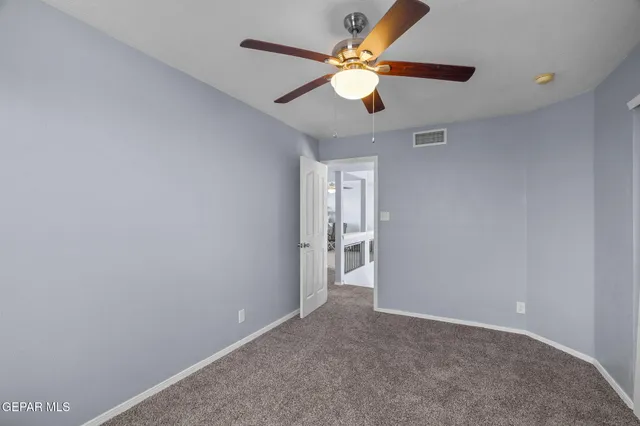 a bathroom with a double vanity sink mirror and bathtub