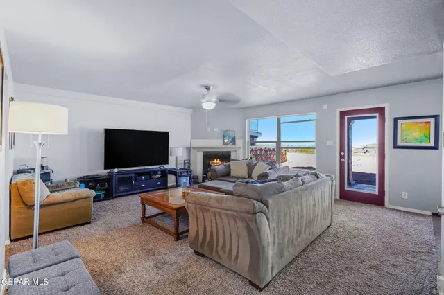 a kitchen with stainless steel appliances granite countertop a stove and a refrigerator