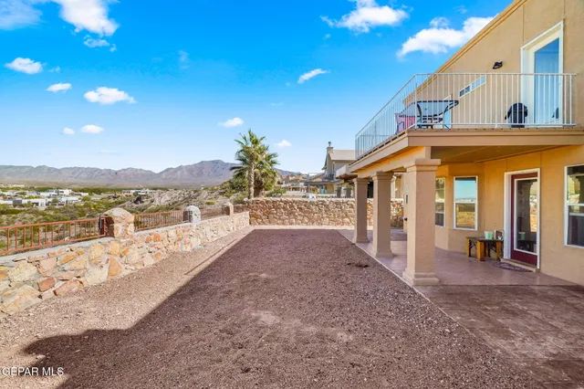 a view of balcony with furniture
