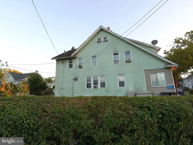 a car parked in front of a house