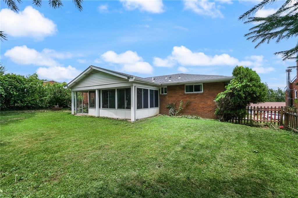 1654 Hollyrood Road Pittsburgh, PA 15227 - Photo 32 of 33 a view of a house with a yard and a garden