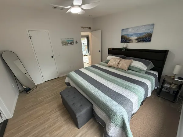 a kitchen with a sink a stove and cabinets
