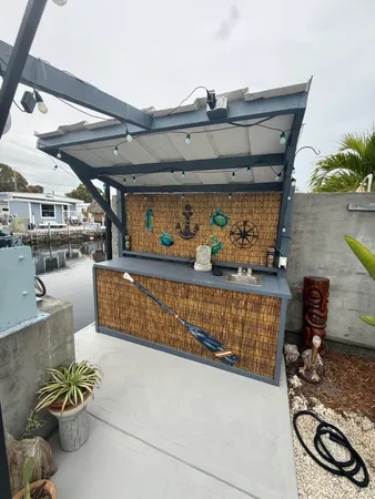 an outdoor space with furniture and potted plants