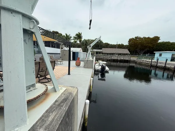 a view of a chairs on the roof deck