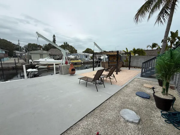 a bedroom with bed and a window